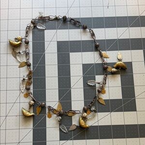 Gold and Silver Bird Charm Leaf Necklace